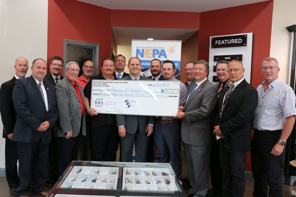 Read more about the article NEPA Alliance Presents Loan Funds to Precision Eye Group